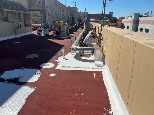 red rooftop being recoated