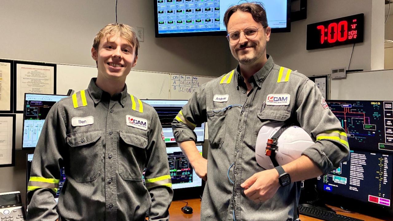 two men in operating engineer uniforms