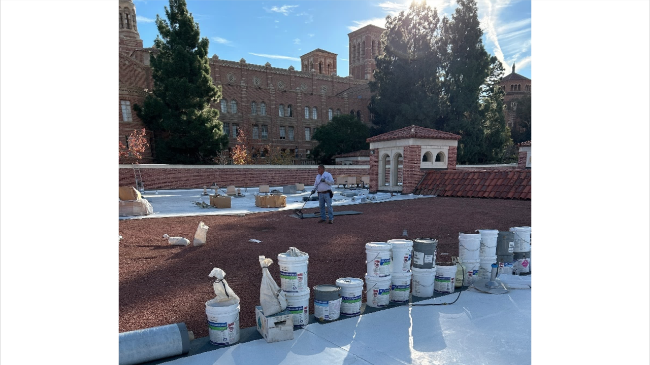 man working on a roof